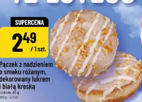 Pączek z nadzieniem o smaku różanym, dekorowany lukrem i białą kreską