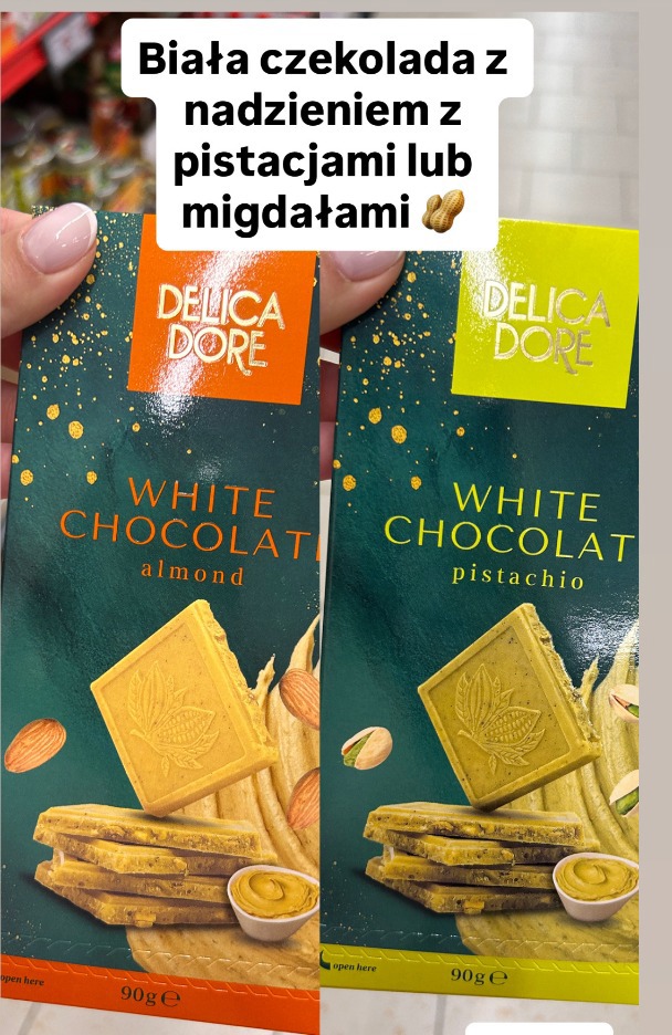 Biała czekolada z nadzieniem z pistacjami lub migdałami Delica Dore